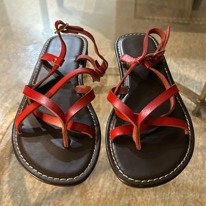 New red leather sandals. Rubber bottom.
